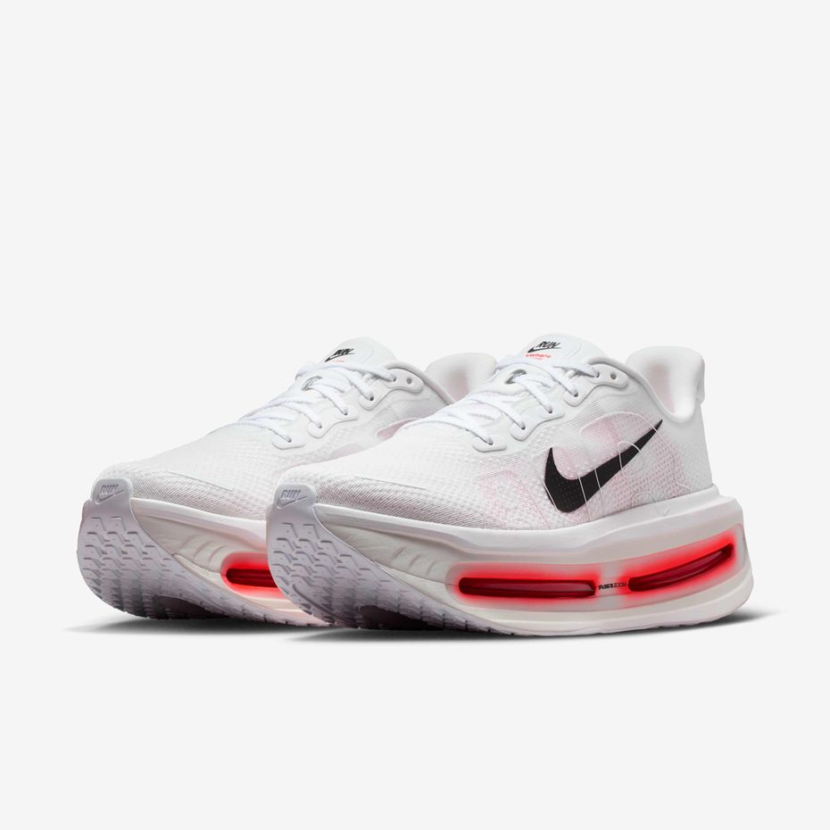 Nike Vomero Premium Road Running Shoes in a 'Sail/Total Orange' colorway