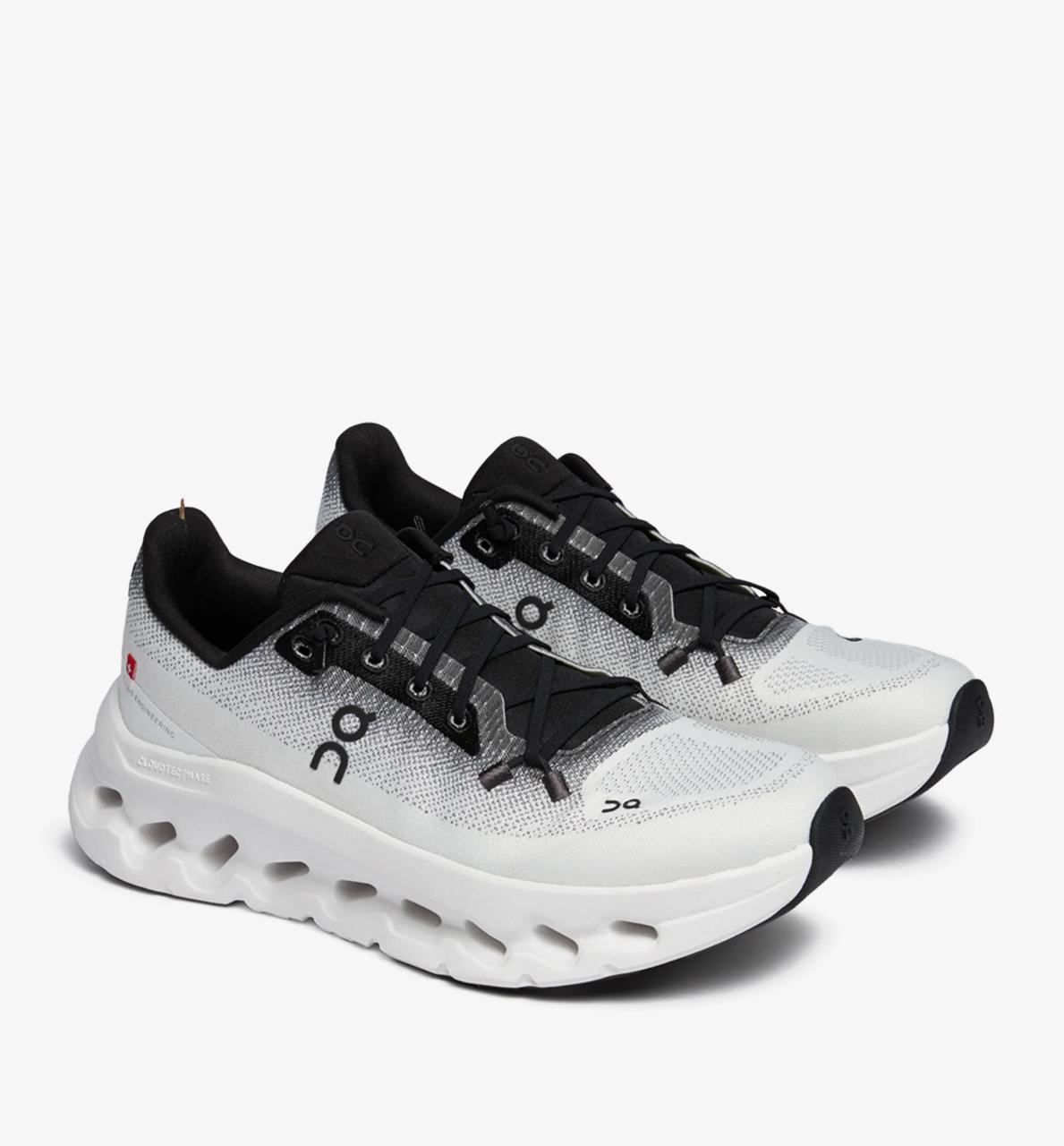 On Cloudtilt Sneakers in white and black with