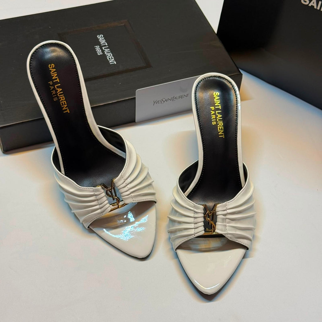 Saint Laurent Babylone stiletto mules, crafted from white gathered leather and highlighted with a gold-tone